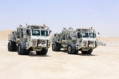 OMV seismic trucks in the desert in Abu Dhabi