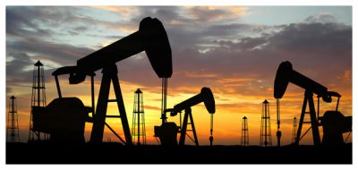 Oil rigs in Texas during sunset